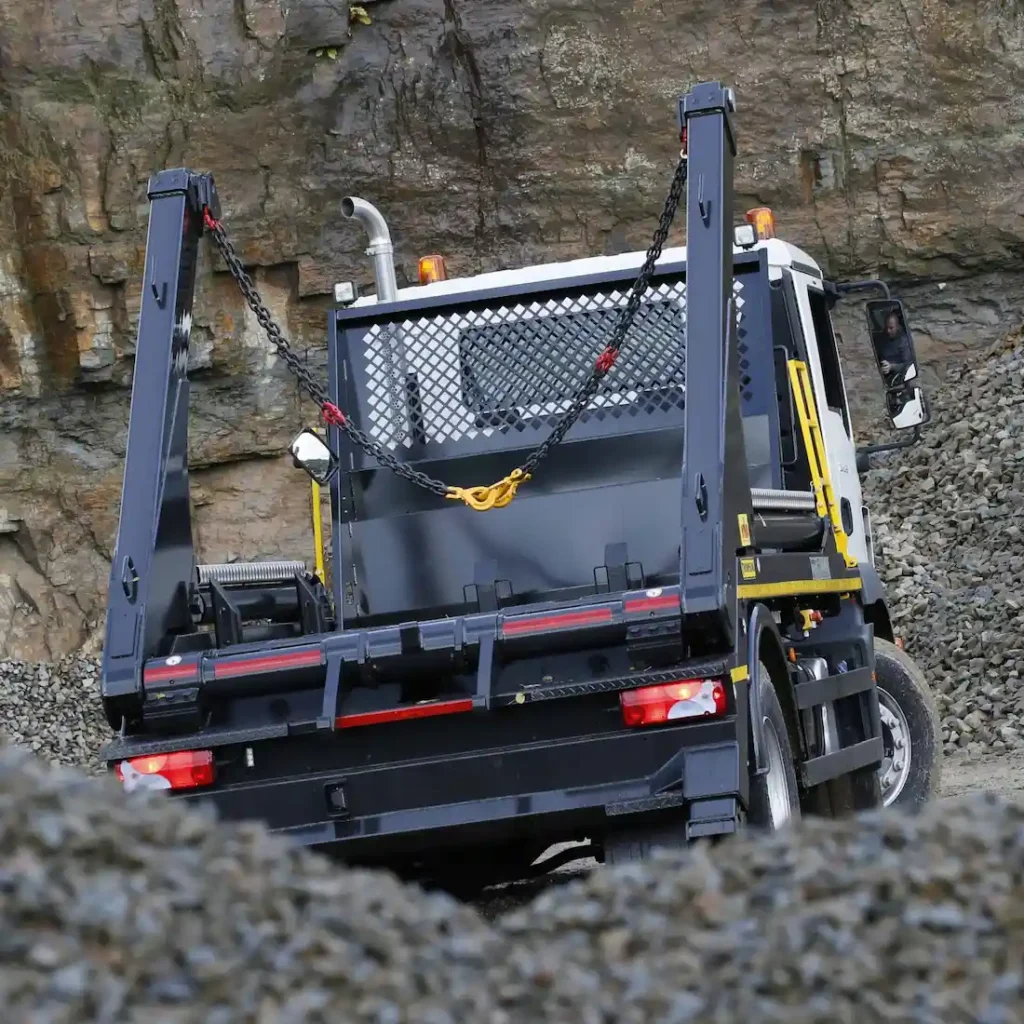 Thompsons Skip loader on a track.